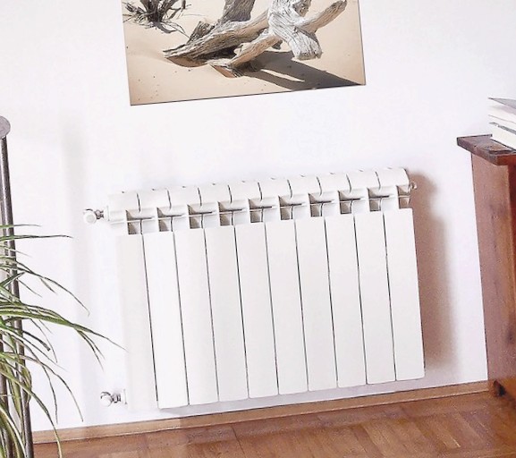 Биметаллический радиатор в интерьере квартиры