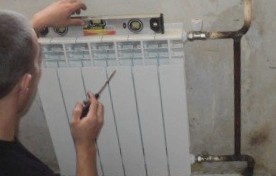Фото монтажа радиатора отопления по уровню, ultra-term.ru