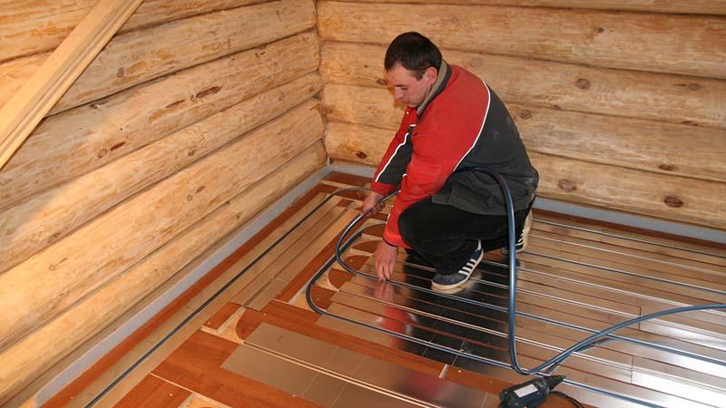 Процесс укладки теплого пола в деревянных домах